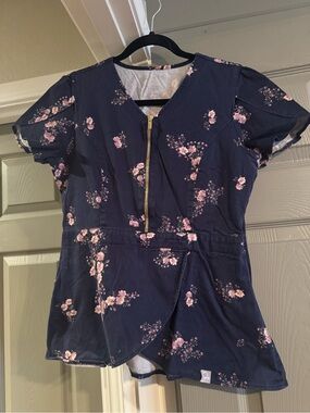 Jaanuu Navy Top with Pink Floral Print & Gold Zip